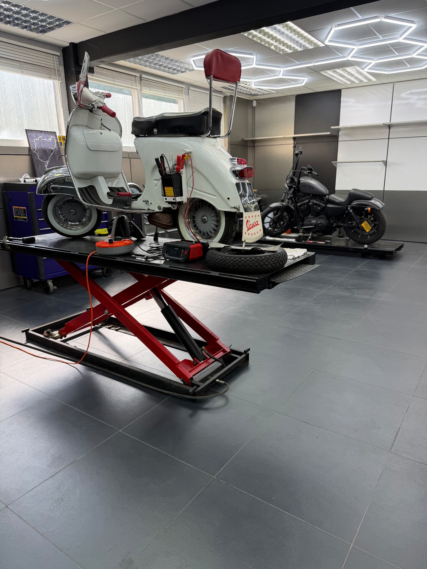 Motorcycle engine components being inspected during diagnostics at Redline MotoLab in Croydon